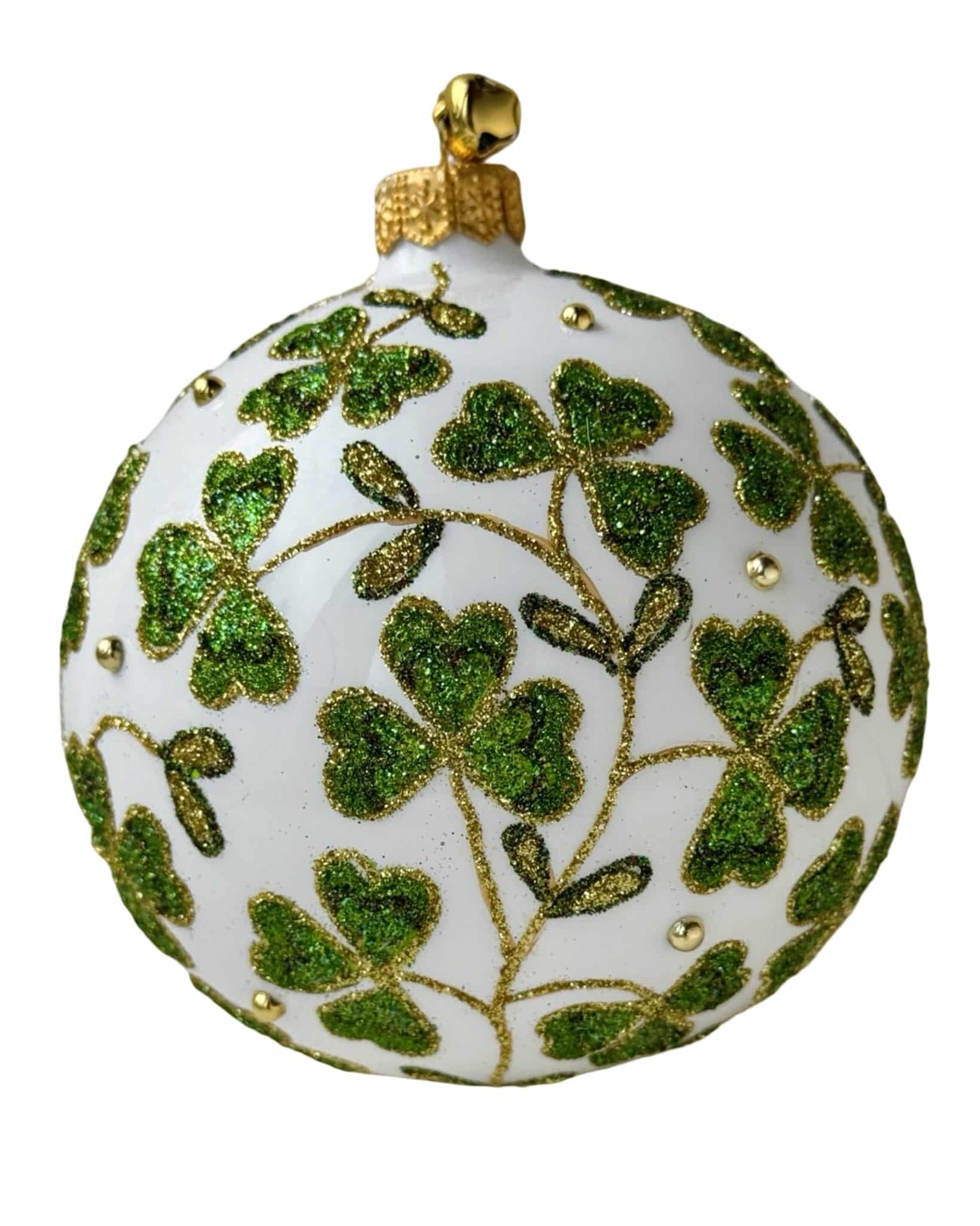 Hand-painted Polish glass white Christmas ball ornament with green glitter shamrock clover design and gold detailing